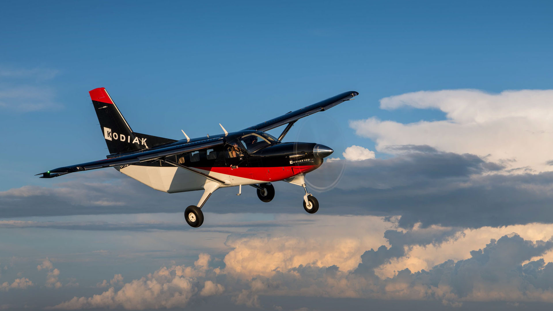 Kodiak 8 kodiak plane in flight among the clouds