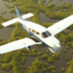 Thumbnail of Piper Aircraft Archer LX flying over the everglades